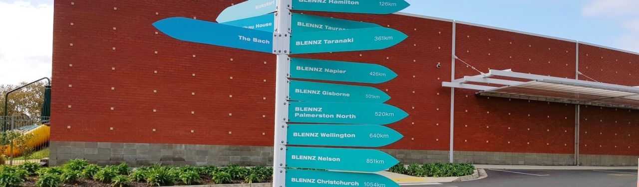 Signpost showing different Visual Resource Centres around New Zealand