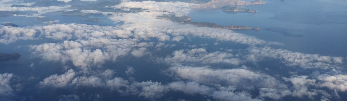 View of New Zealand and clouds from a plane