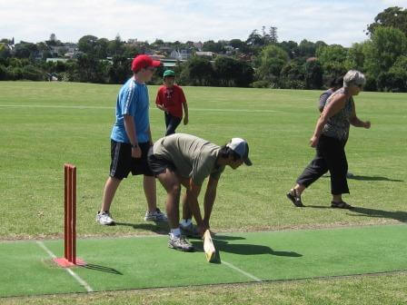 Four BLENNZ students on the cricket field