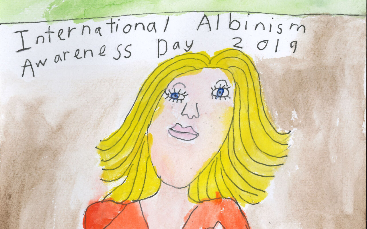 Hand drawn self portrait by Sophia with the words International Albinism Awareness Day 2019 above her head