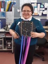 Figure 1 - Te Ngaru is standing up showing her finished Matariki day kite